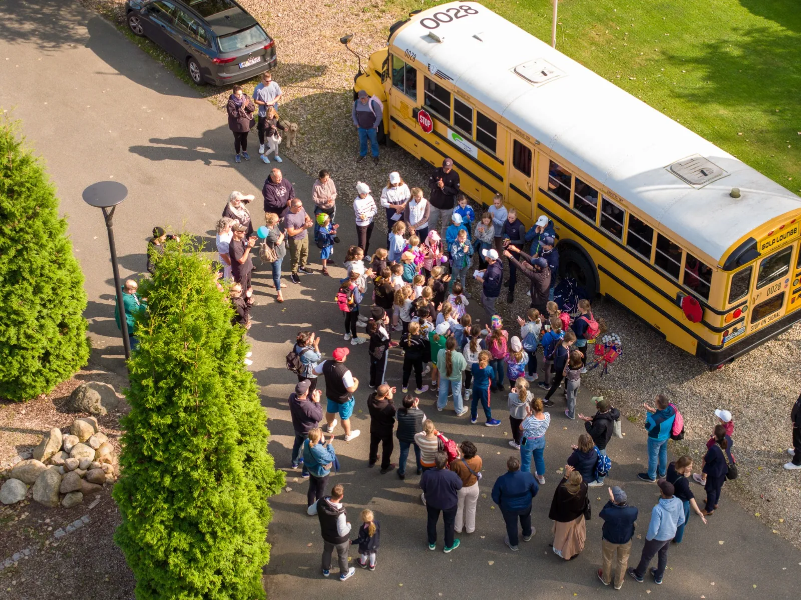 Group photo in front of Golf Lounge bus - HGV Taster Day